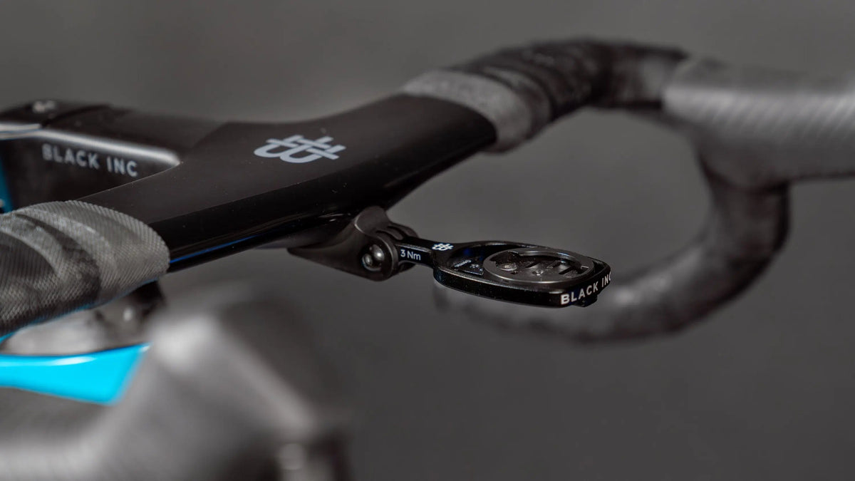 Black Inc integrated carbon handlebar and computer mount on a Factor Ostro VAM