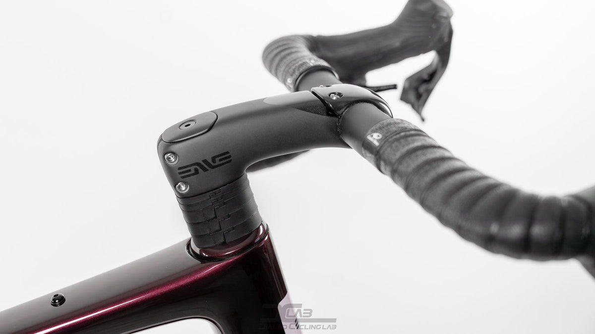 ENVE stem and drop handlebar on a road bike, with spacers stacked under the stem