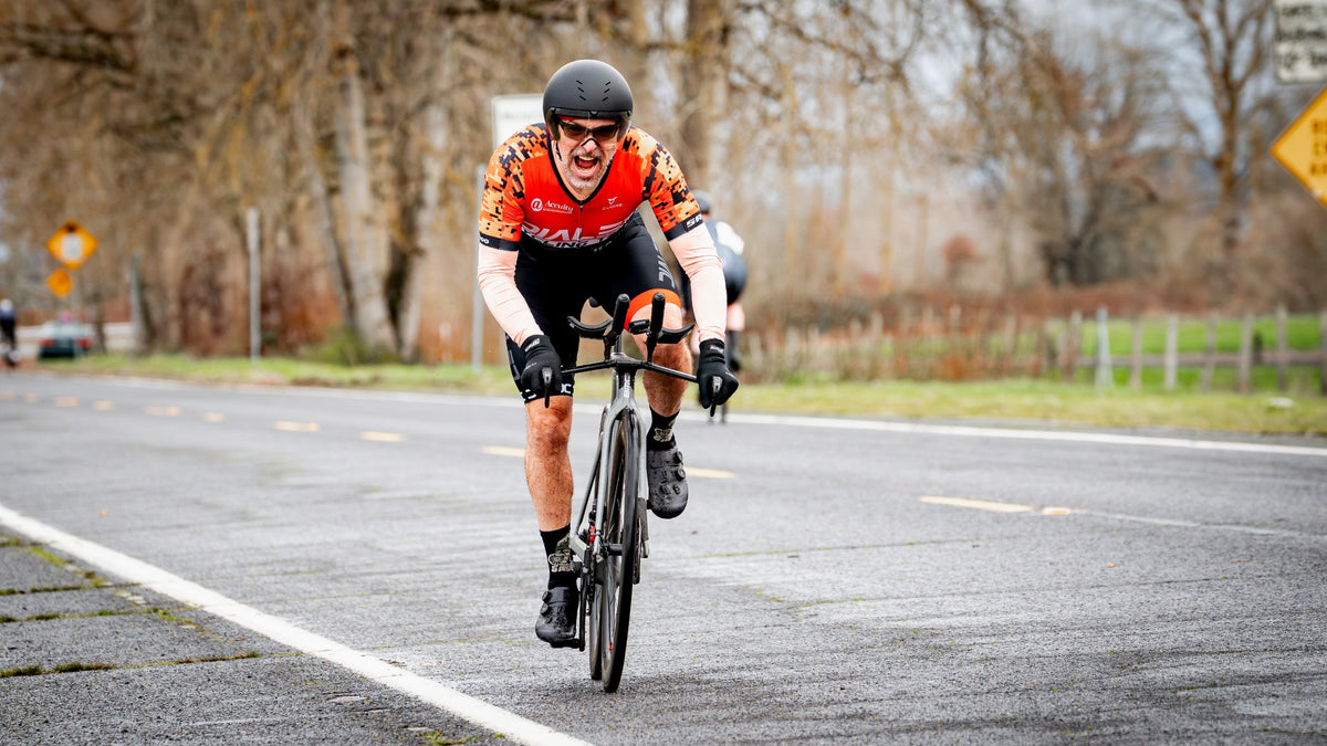 Dialed Cycling Team rider digging deep in a road time trial