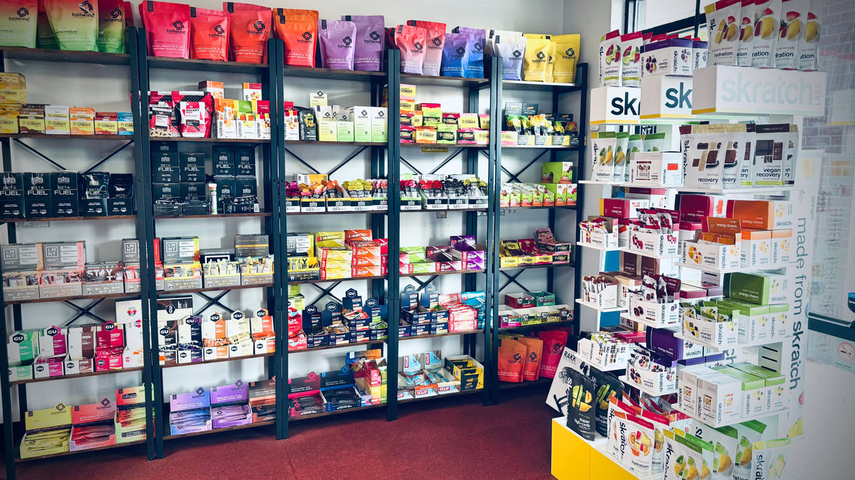 Ride food and drink mix shelves in the Dialed Cycling Lab nutrition wall