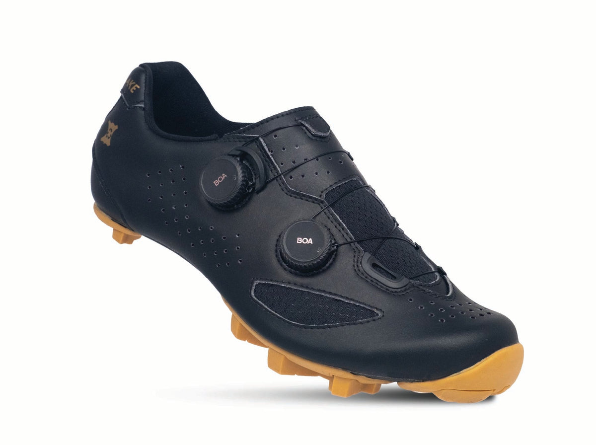 Lake MX239 Gravel shoe in Black/Gold, front three-quarter view