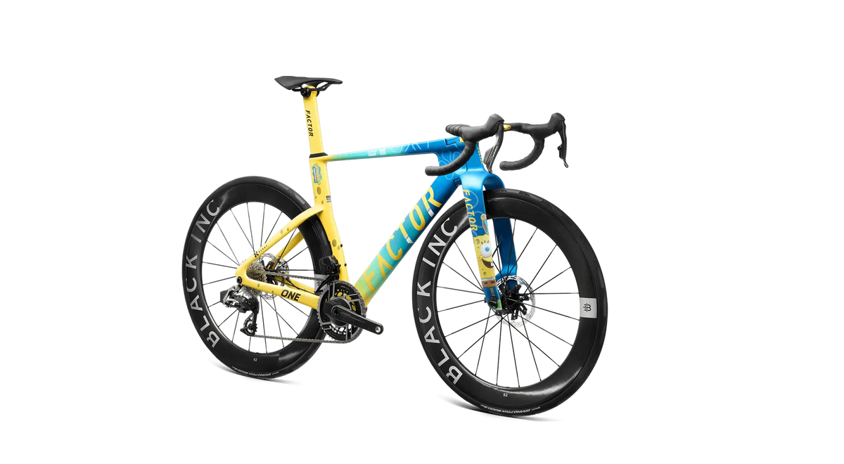 Factor ONE SpongeBob Edition, drivetrain side three-quarter view showing the SpongeBob fork graphic, shown with SRAM Red and Black Inc 62 wheels