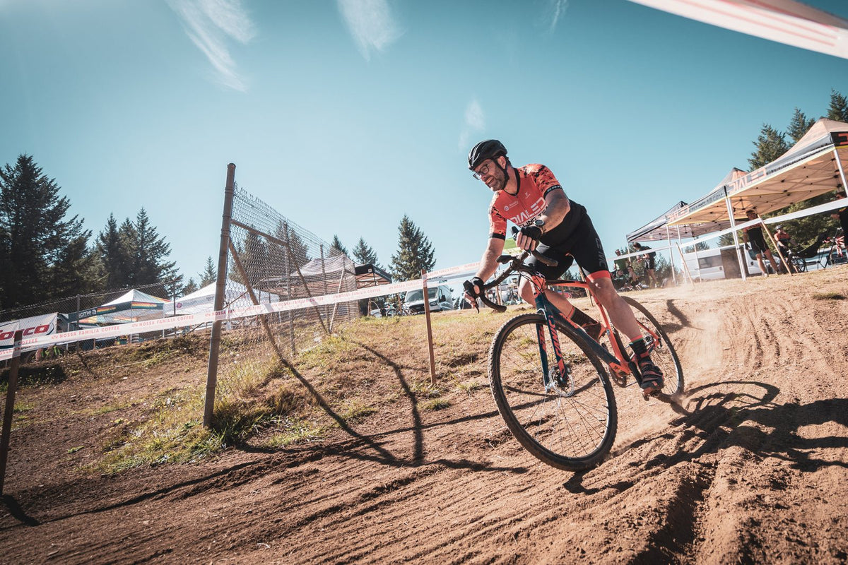 Dialed cyclocross racer on a dirt corner