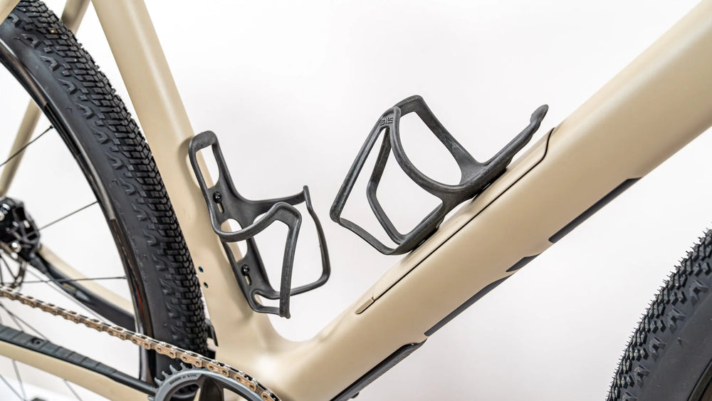 ENVE bottle cages on a tan ENVE gravel frame built at Dialed Cycling Lab