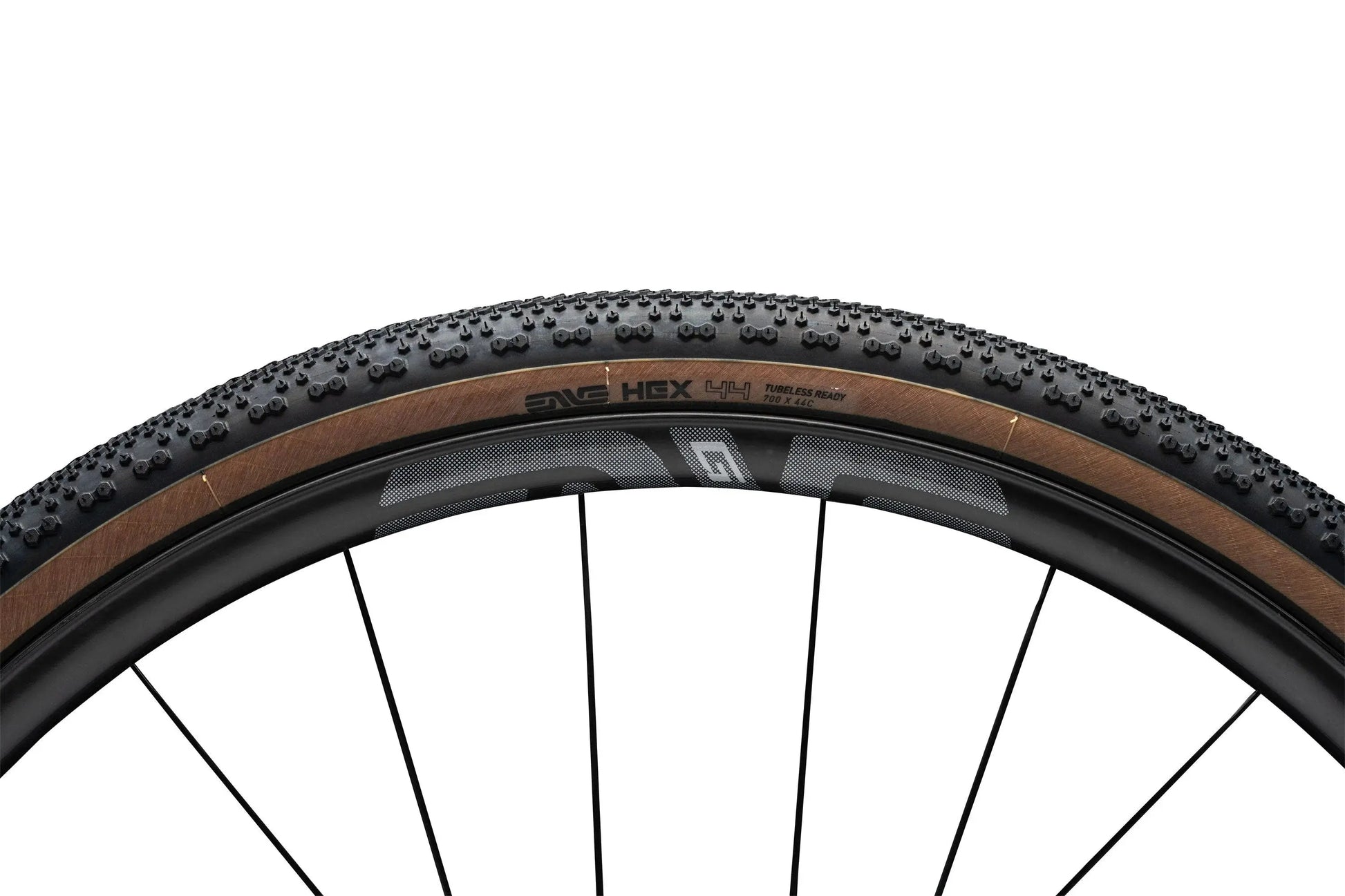 ENVE HEX Gravel Tire in tan, 700 x 44, hexagonal tread mounted on wheel