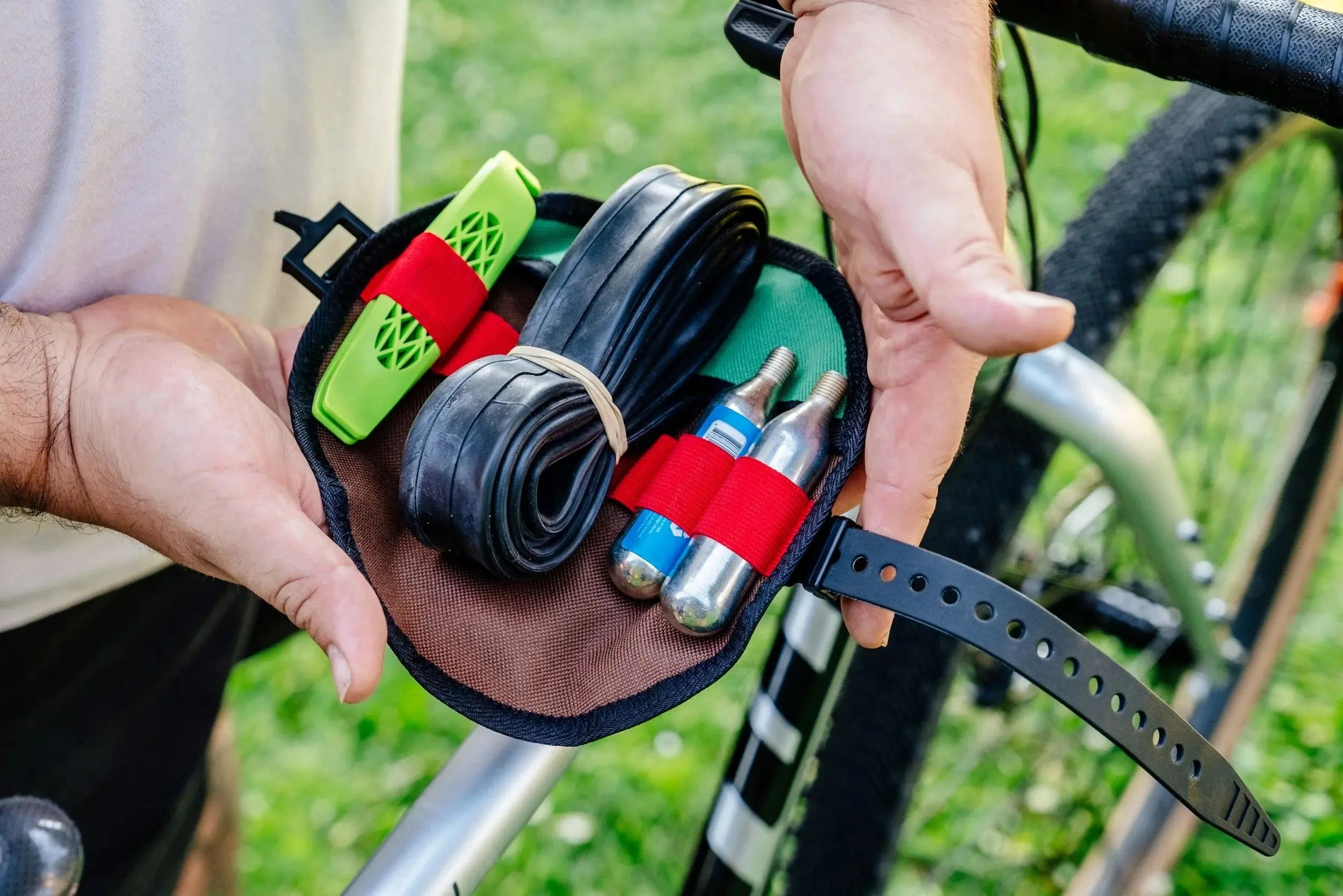 PDW Tube Taco loaded with tools and rolled with Voile Strap