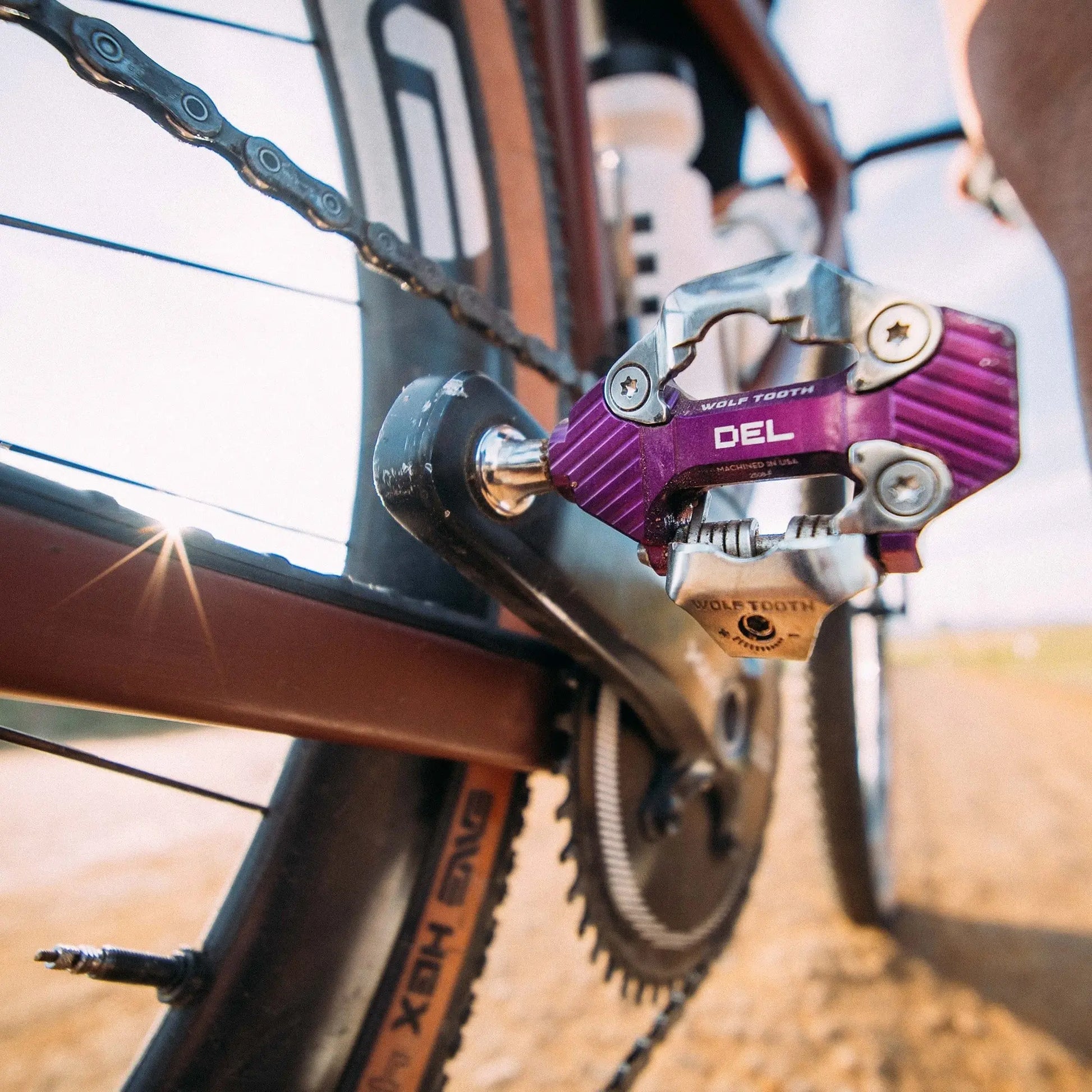 Wolf Tooth DEL Gravel Race pedals in use on a gravel bike